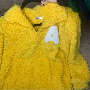 Fuzzy yellow sweater